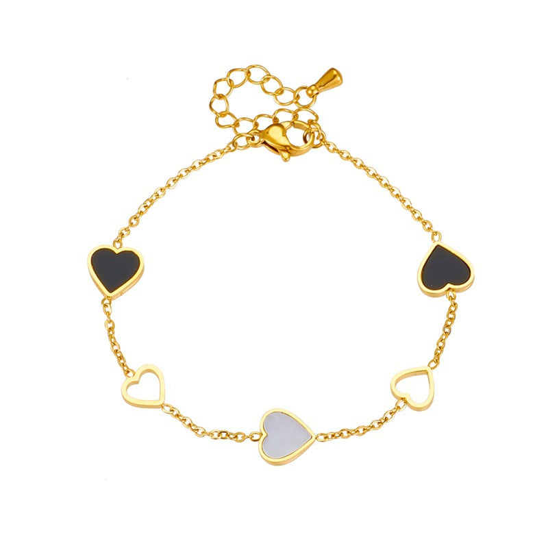 Pulsera Chapada en Oro de 18K con Corazones en Blanco y Negro