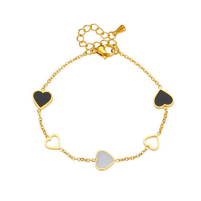 Pulsera Chapada en Oro de 18K con Corazones en Blanco y Negro