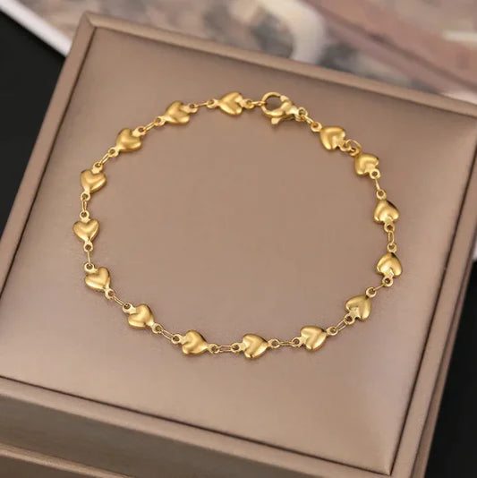 Pulsera Multi Corazones Chapada en Oro de 18K (Una Pieza)